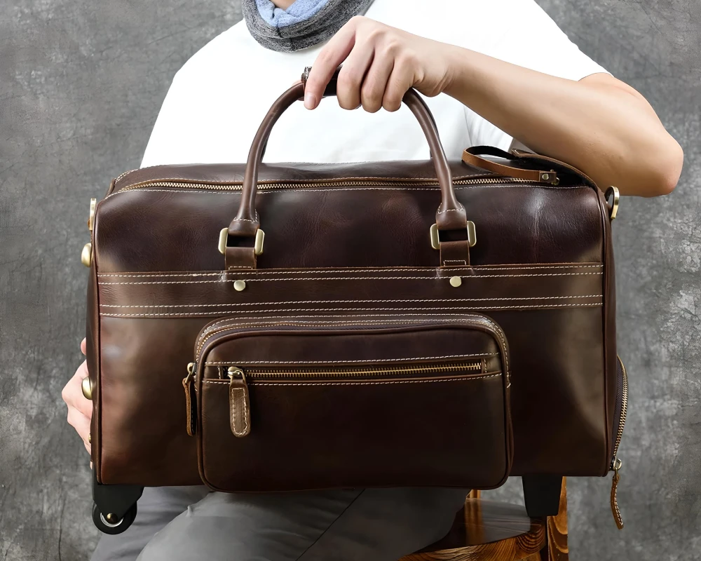 leather carry on bag wheels